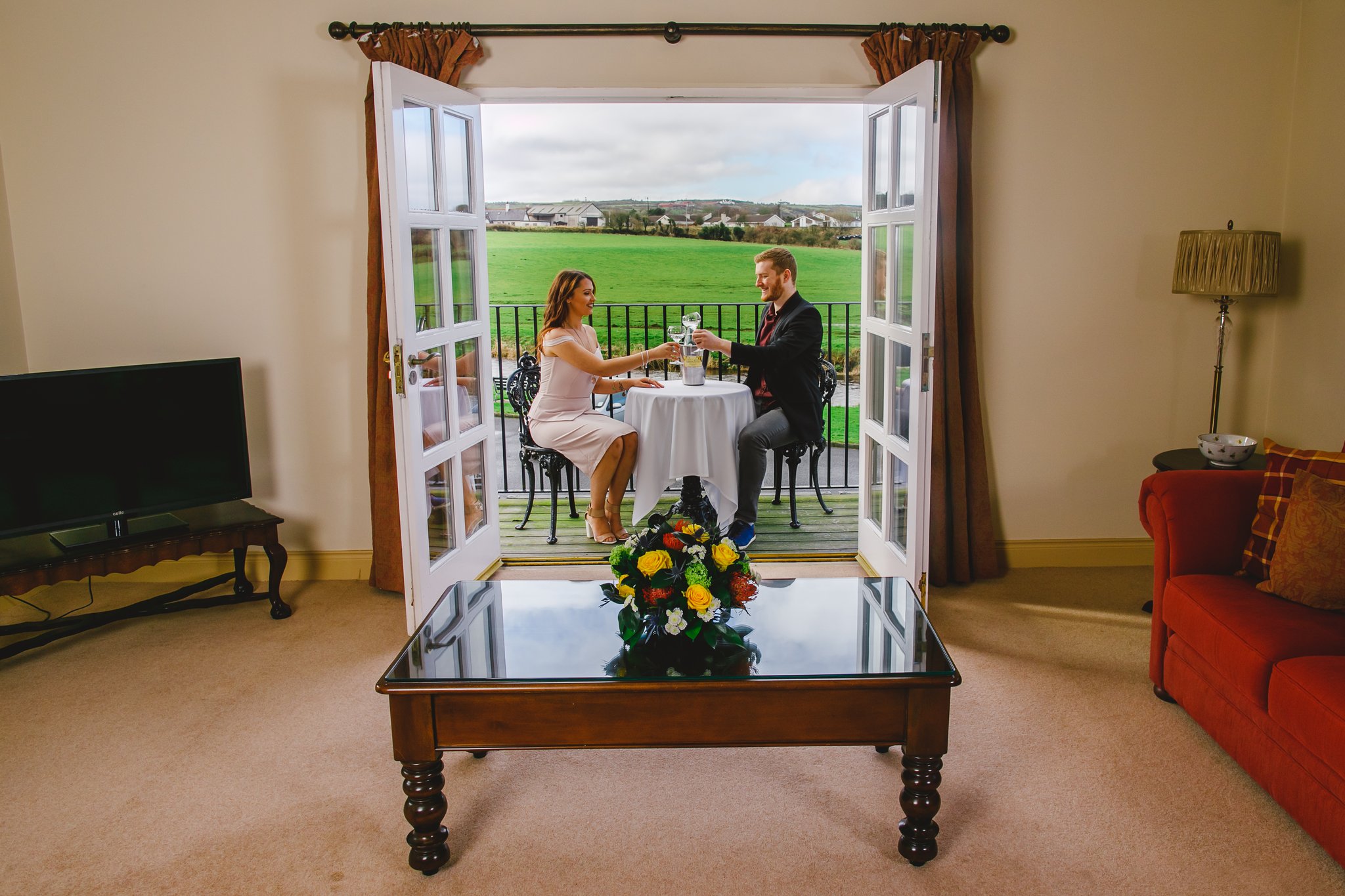 Master_Distillers_couple_on_balcony_S