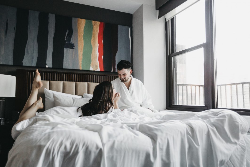 The Fifty Sonesta Select NY Guestroom Couple