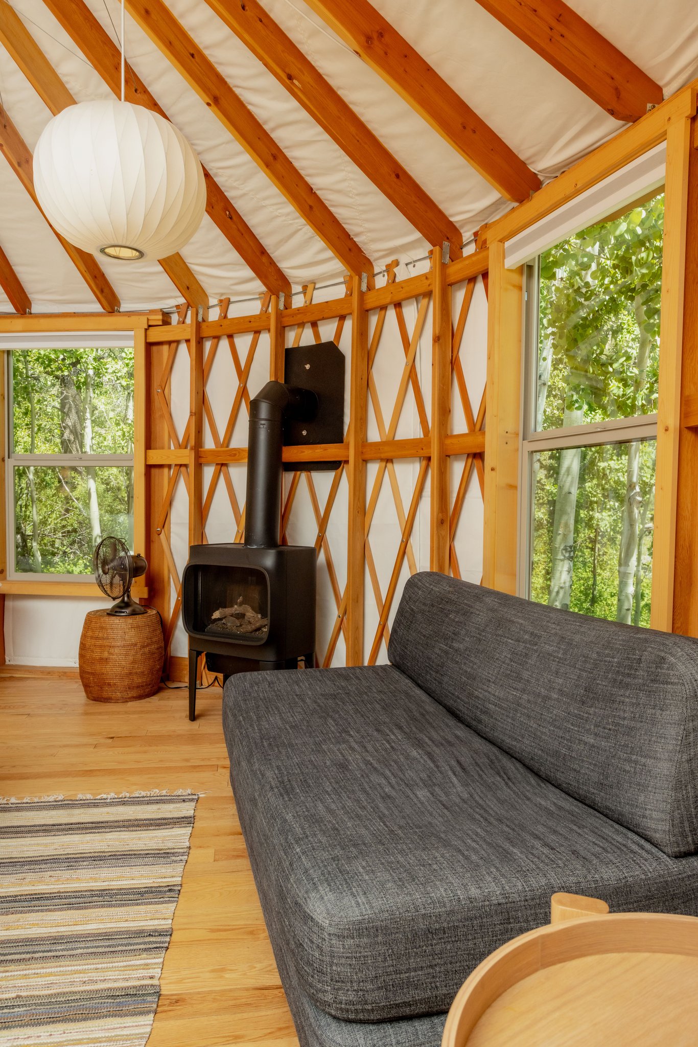Yurt24_couch_and_fireplace_S