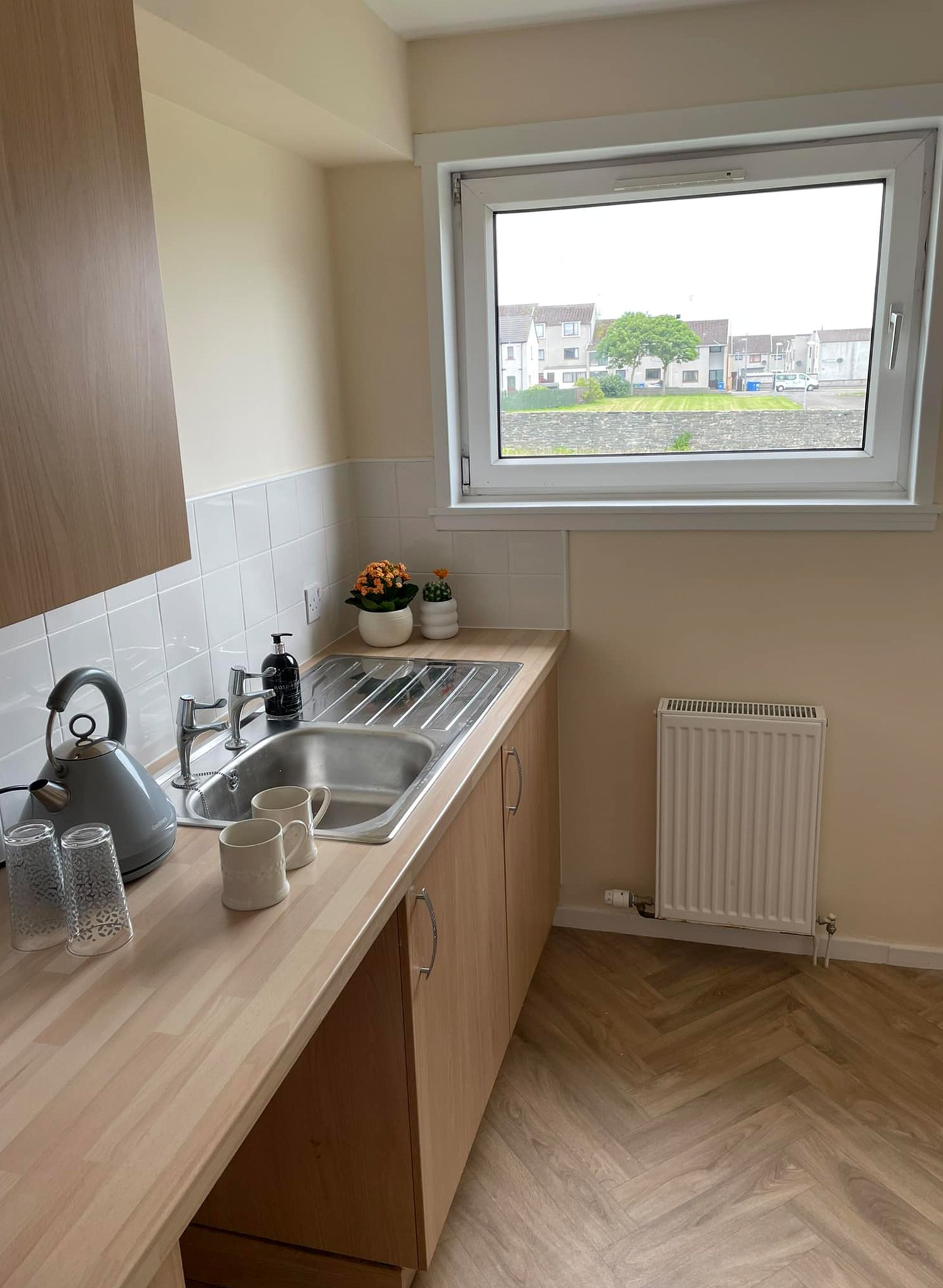 Kitchen_with_rear_of_property_view_S