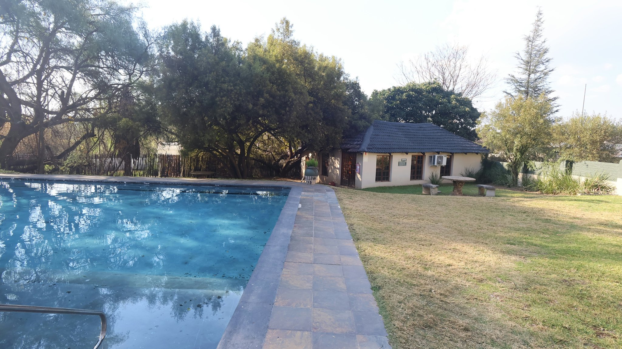 7QtVTP4qkCYE66PyAfFCA_Pool_area_and_grounds_S