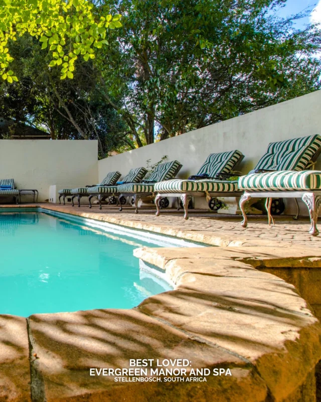 Set beneath oak trees in the heart of Stellenbosch, Evergreen Manor and Spa brings together Cape Winelands scenery, heritage architecture and a slower style of luxury travel. 

The 1904 manor house sits minutes from wine bars, galleries and the university district, making it one of the best places to stay in Stellenbosch for travellers who want culture alongside wellness. Rooms are filled with antique details, while the spa focuses on reflexology, body treatments and long afternoons by the pool. Historic hotels in South Africa rarely feel this connected to local life. 

Would you choose the wine estates, the wellness treatments or the historic town first?

#BestLovedHotels #hotels #travel